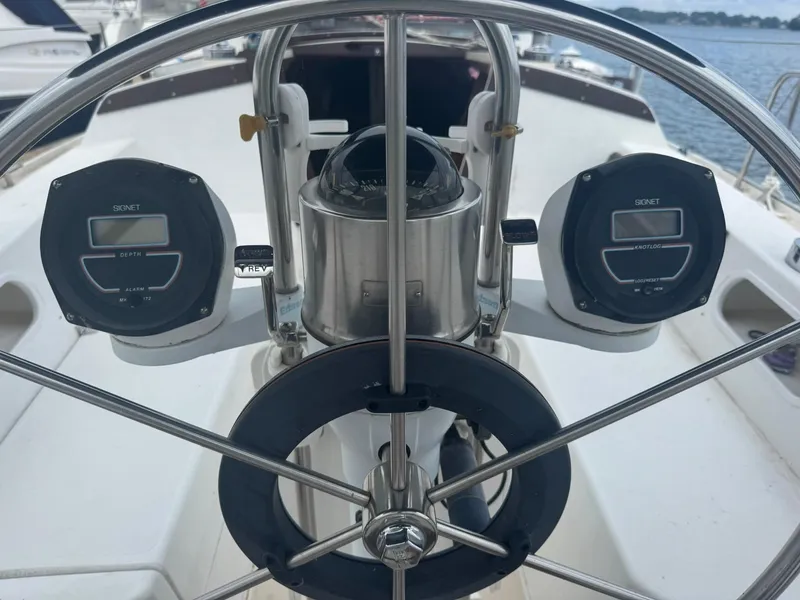 Slide: The Image of Steering wheel and instruments on a 1989 Catalina 34 sailboat. - 6