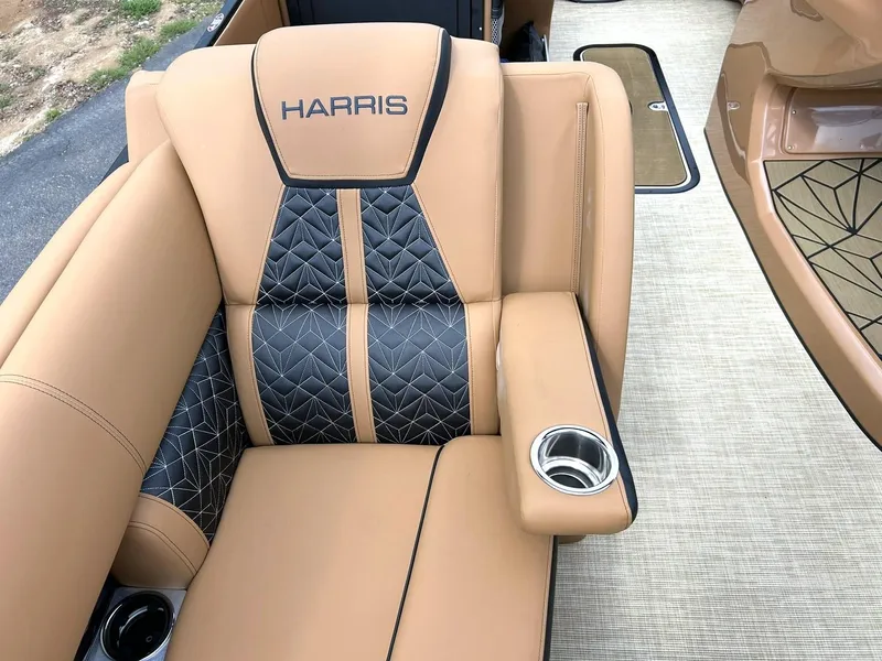 Slide: The Image of Luxurious seating on 2023 Harris Grand Mariner 230 boat with tan and black upholstery. - 37