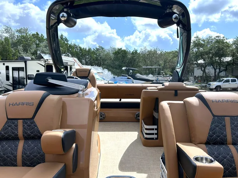 Slide: The Image of 2023 Harris Grand Mariner 230 interior with luxurious seating and modern design. - 46