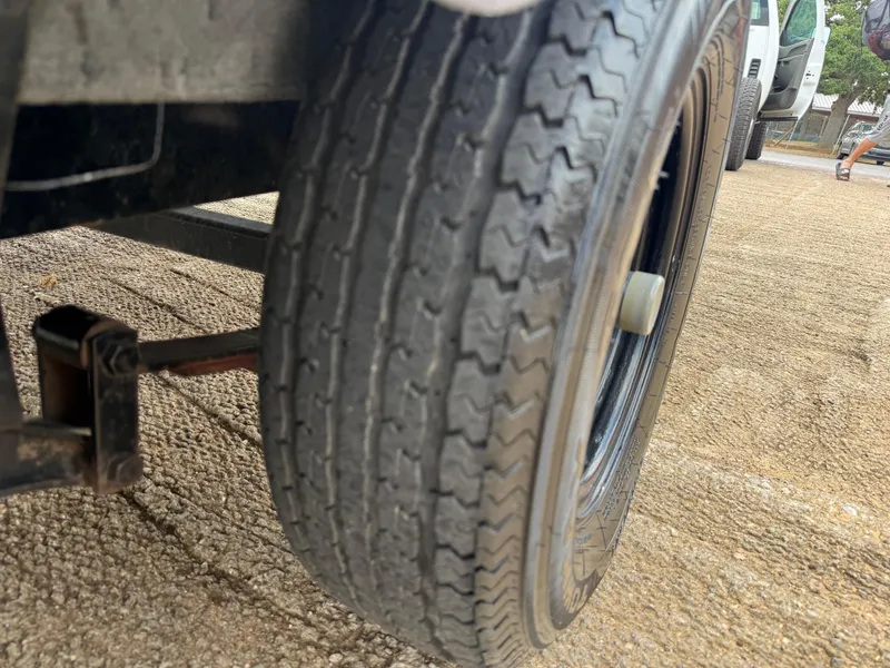 Slide: The Image of Close-up of a 2003 Skeeter SX190 boat trailer tire. - 19