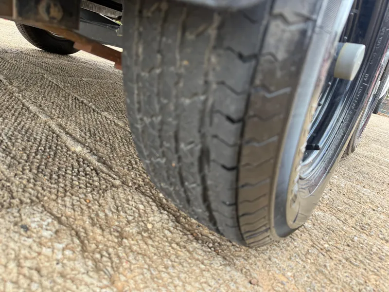 Slide: The Image of Close-up of a 2003 Skeeter SX190 boat trailer tire. - 20