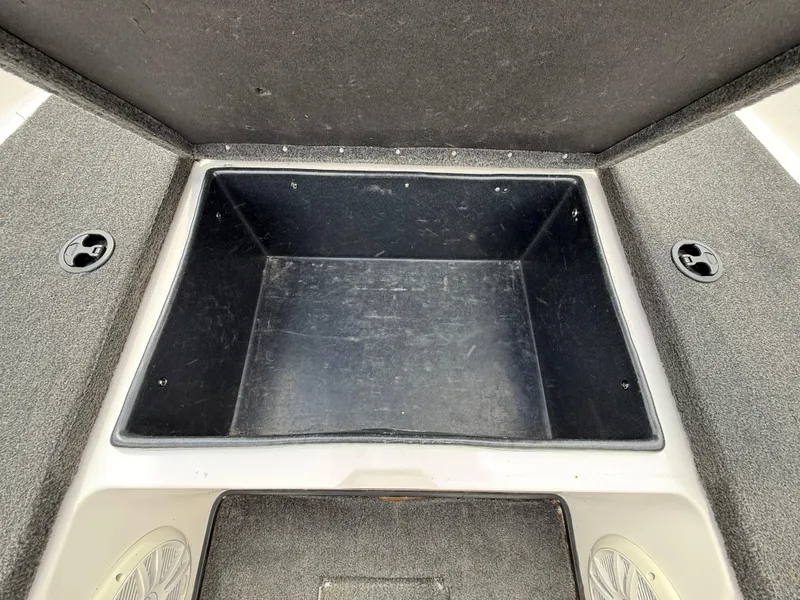 Slide: The Image of Open storage compartment in 2003 Skeeter SX190 boat. - 31