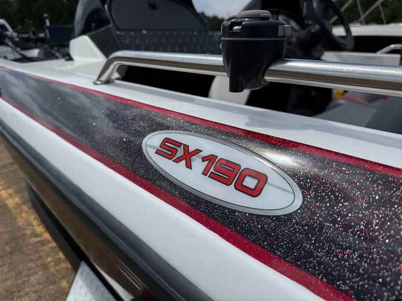 Slide: The Image of Interior of a 2003 Skeeter SX190 boat, empty compartment. - 44