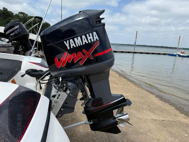 Slide: The Image of Interior of a 2003 Skeeter SX190 boat, empty storage compartment. - 46
