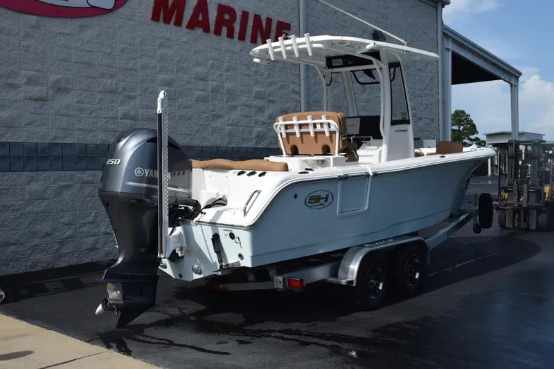 Slide: The Image of 2019 Sea Hunt Ultra 235 SE boat with Yamaha 250 engine on trailer. - 4