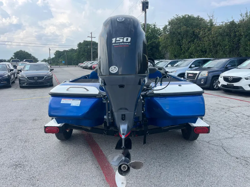 Slide: The Image of 2018 Skeeter ZX190 boat with 150 horsepower engine in parking lot. - 10