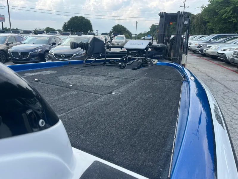 Slide: The Image of 2018 Skeeter ZX190 boat with Garmin equipment, parked among cars in a lot. - 17