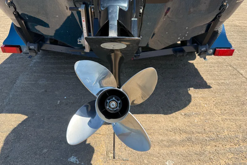 Slide: The Image of Propeller of a 1999 Ranger 620VS Fisherman boat on a trailer. - 17