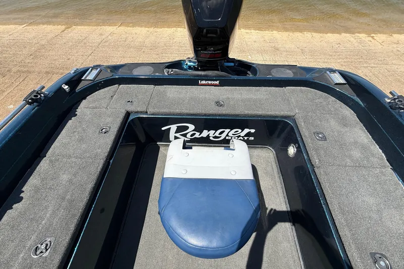 Slide: The Image of 1999 Ranger 620VS Fisherman boat interior with seating and storage compartments. - 47