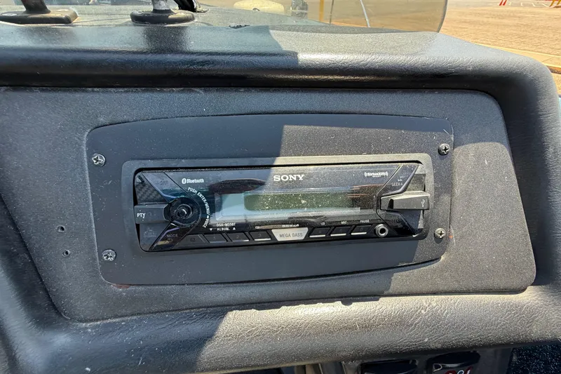 Slide: The Image of Sony stereo system in a 1999 Ranger 620VS Fisherman boat dashboard. - 49