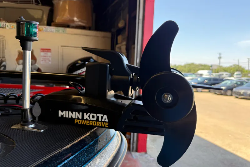 Slide: The Image of Minn Kota PowerDrive motor on 1999 Ranger 620VS Fisherman boat in garage. - 53