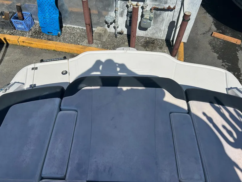 Slide: The Image of 2018 Chaparral 21 H2O Surf boat interior with shadows on seats. - 13