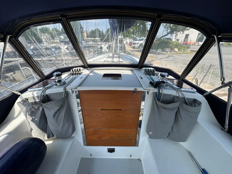 Slide: The Image of Cockpit of 2005 Catalina 36 MkII sailboat with wooden storage and control panels. - 8
