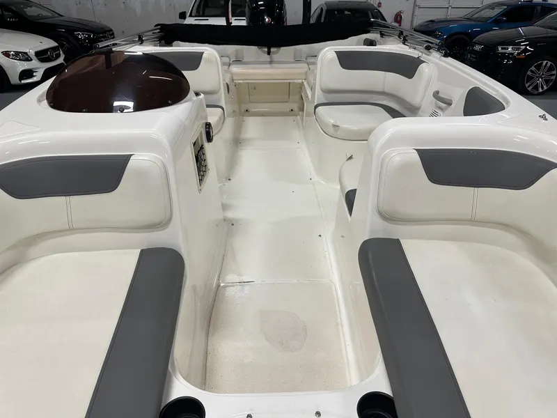 Slide: The Image of 2021 Bayliner Element E18 boat interior with spacious seating and modern design. - 15
