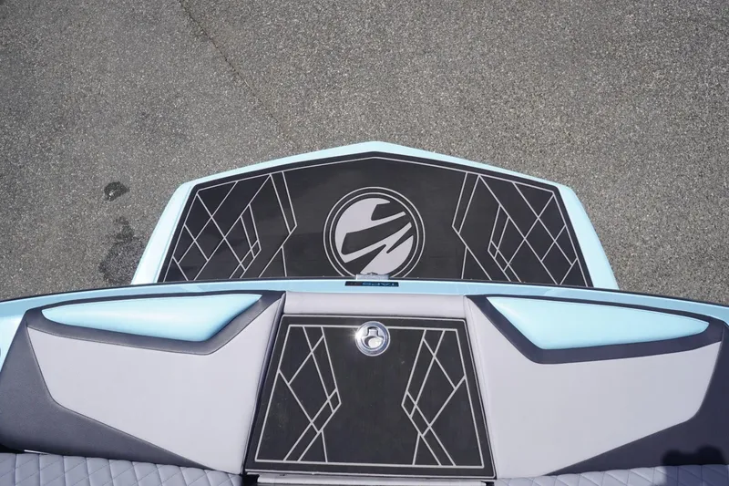 Slide: The Image of 2023 Tigé 23ZX boat deck with sleek design and geometric patterns. - 28