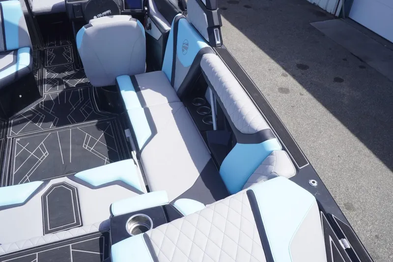 Slide: The Image of 2023 Tigé 23ZX boat interior with modern seating and stylish design. - 35