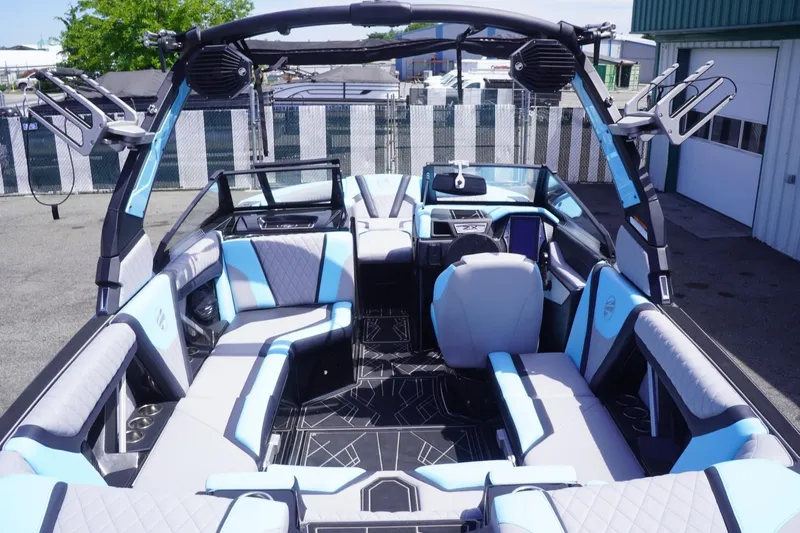 Slide: The Image of 2023 Tigé 23ZX boat interior with modern seating and sleek design. - 36