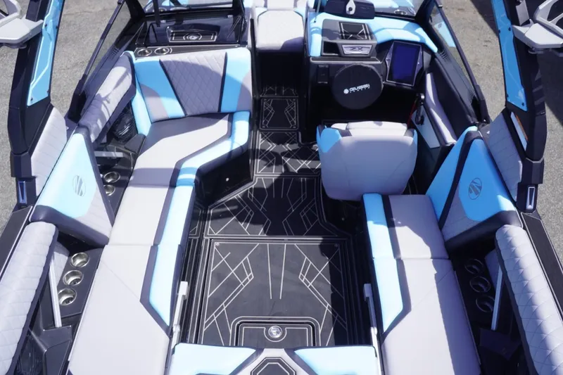 Slide: The Image of 2023 Tigé 23ZX boat interior with modern seating and sleek design. - 37