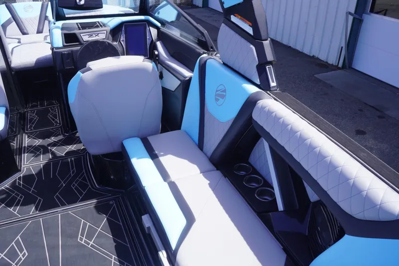 Slide: The Image of 2023 Tigé 23ZX boat interior with modern seating and sleek design. - 40