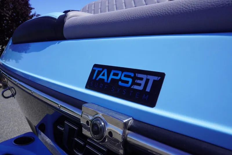 Slide: The Image of 2023 Tigé 23ZX boat featuring TAPS 3T surf system, close-up view. - 5