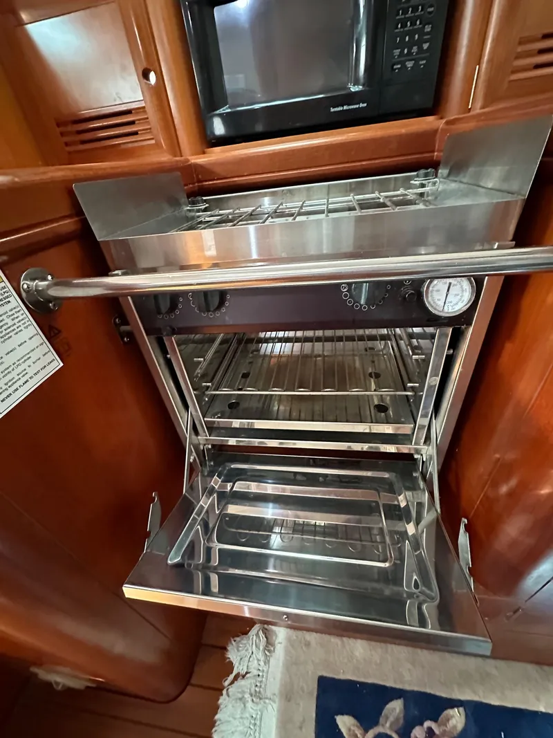 Slide: The Image of Stainless steel oven in 2002 Beneteau 411 yacht kitchen interior. - 37