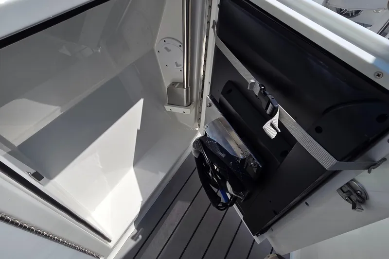 Slide: The Image of Storage compartment in a 2021 Formula 380 Super Sport Crossover OB boat. - 22