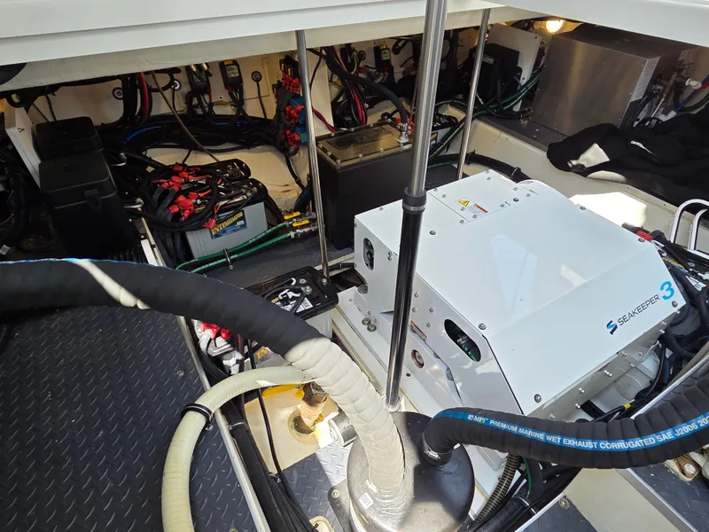 Slide: The Image of Engine room of 2021 Formula 380 Super Sport Crossover OB with Seakeeper 3 stabilizer. - 26