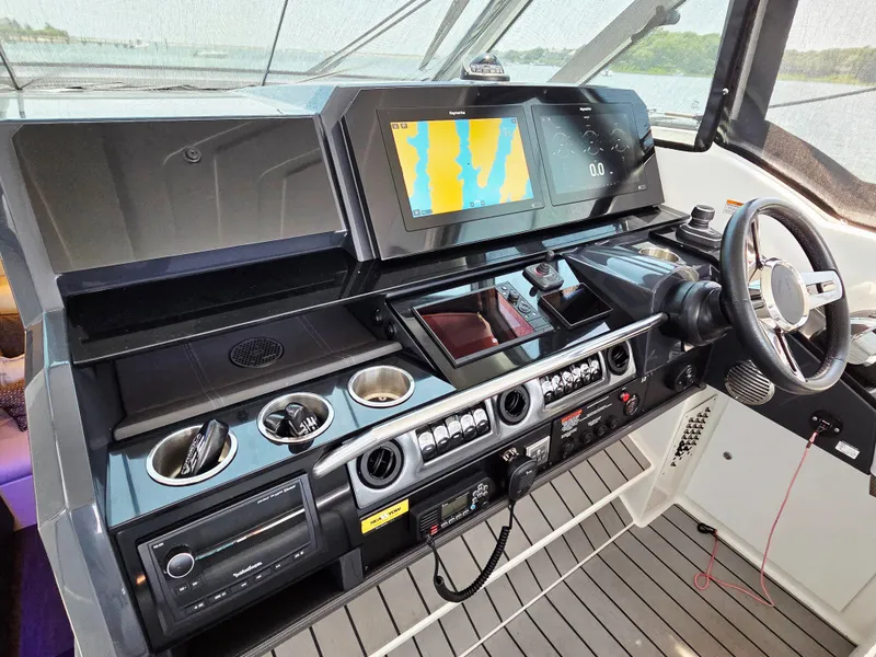 Slide: The Image of Helm of 2021 Formula 380 Super Sport Crossover OB with advanced navigation system. - 7