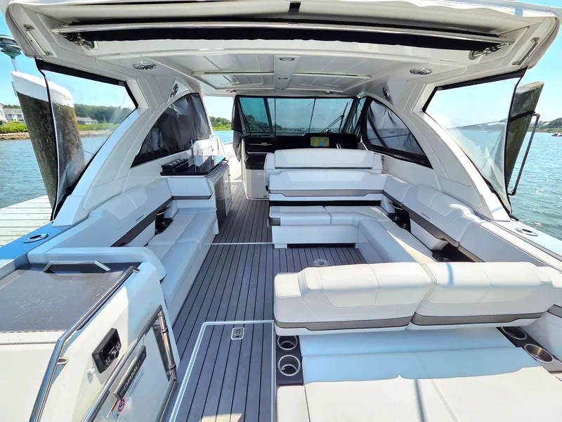 Slide: The Image of 2021 Formula 380 Super Sport Crossover OB interior with spacious seating and modern design. - 8