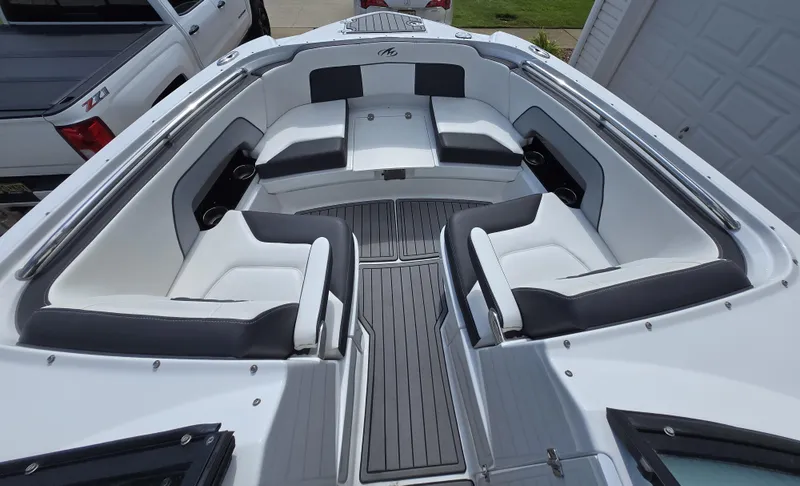 Slide: The Image of 2021 Monterey M-65 boat interior with sleek seating and modern design. - 18