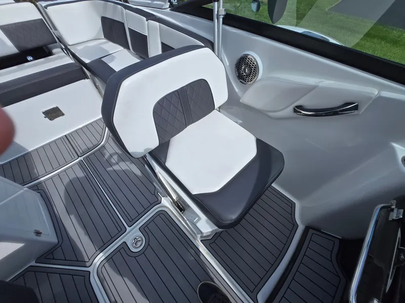 Slide: The Image of 2021 Monterey M-65 boat interior with sleek seating and modern design. - 23