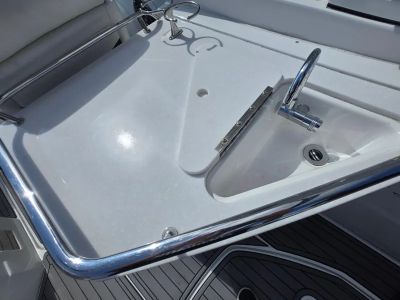 Slide: The Image of Stainless steel sink on 2021 Monterey M-65 boat with modern fixtures. - 25