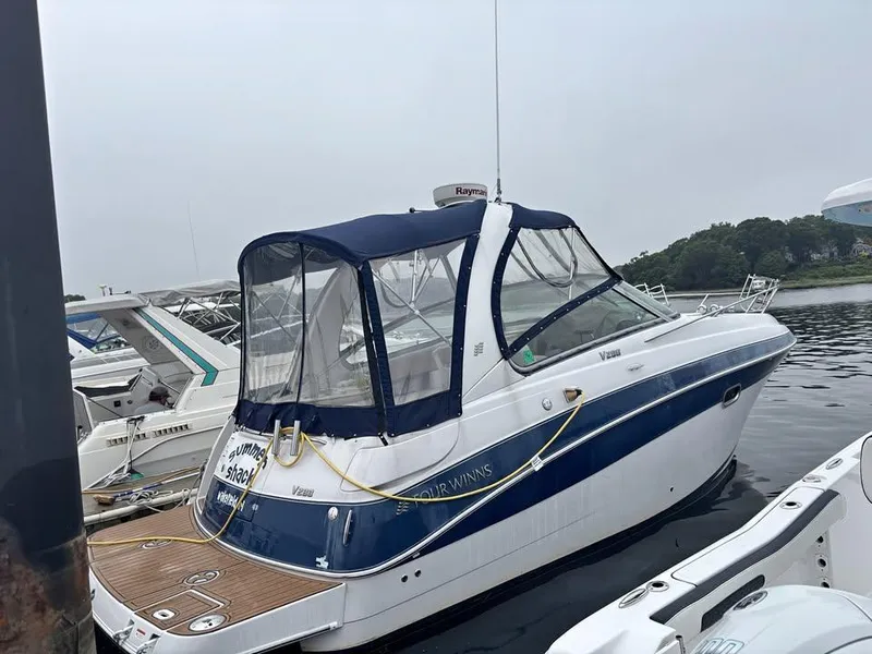 The Image of 2009 Four Winns 288 Vista boat docked in a marina. - 0