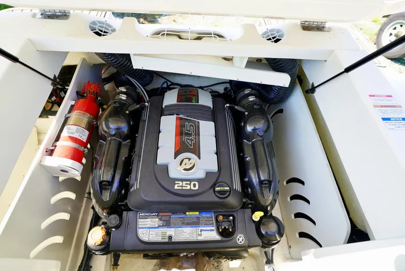 Slide: The Image of Engine compartment of 2018 Sea Ray SPX 230 with Mercury 4.5L 250 HP engine. - 10