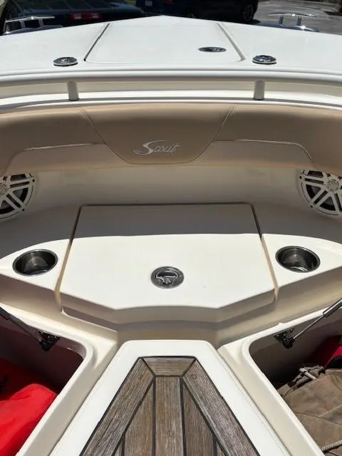 Slide: The Image of 2018 Scout 355 LXF boat deck with sleek design and spacious layout. - 39