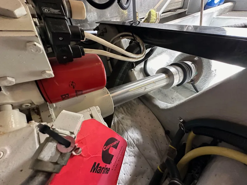 Slide: The Image of Engine compartment of a 2004 Meridian 580 Pilothouse with Cummins Marine components. - 46