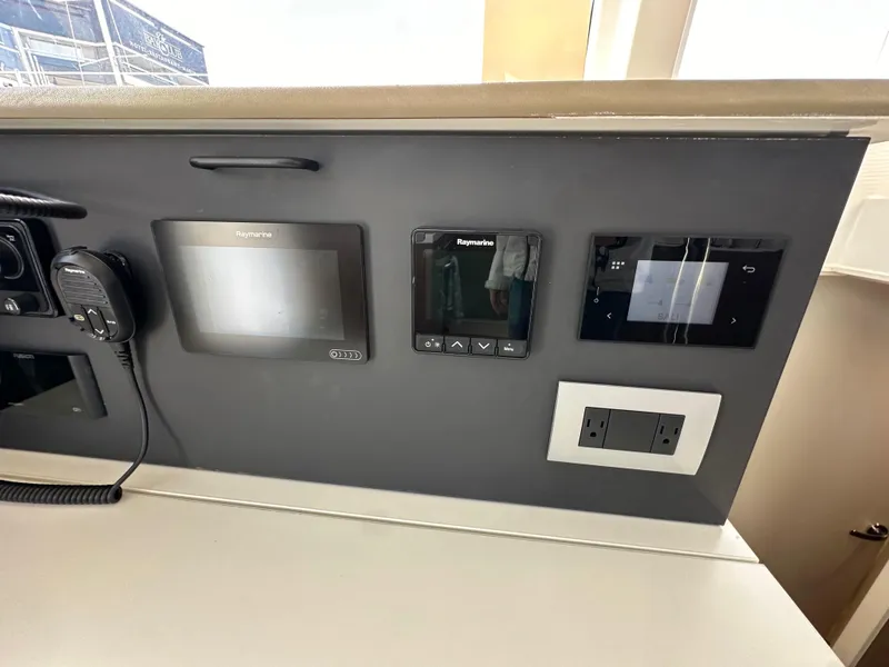 Slide: The Image of Control panel of 2023 Bali 4.2 yacht with navigation and communication devices. - 46