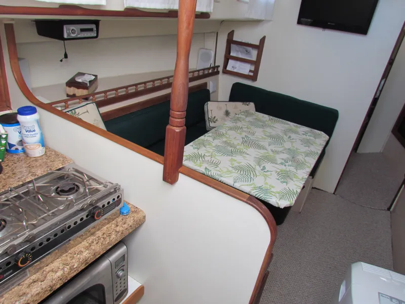 Slide: The Image of Electrical panel on a 1972 Morgan 35 sailboat, featuring labeled switches and fuses. - 21