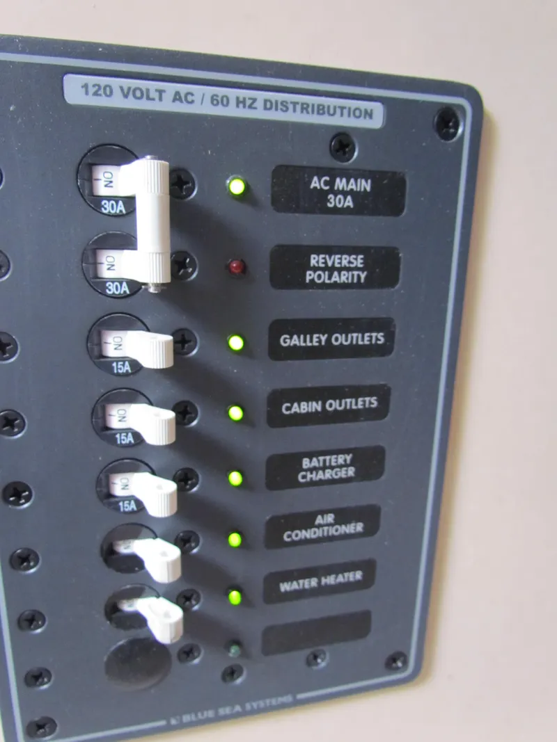 Slide: The Image of Marine toilet in a 1972 Morgan 35 sailboat, featuring a manual pump handle. - 33