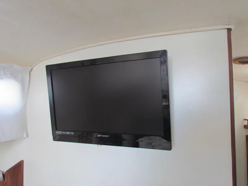 Slide: The Image of 1972 Morgan 35 boat sink with faucet and wooden trim. - 34