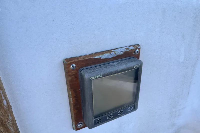 Slide: The Image of Clipper Duet instrument on 1972 Morgan 35 sailboat, mounted on weathered wooden panel. - 43