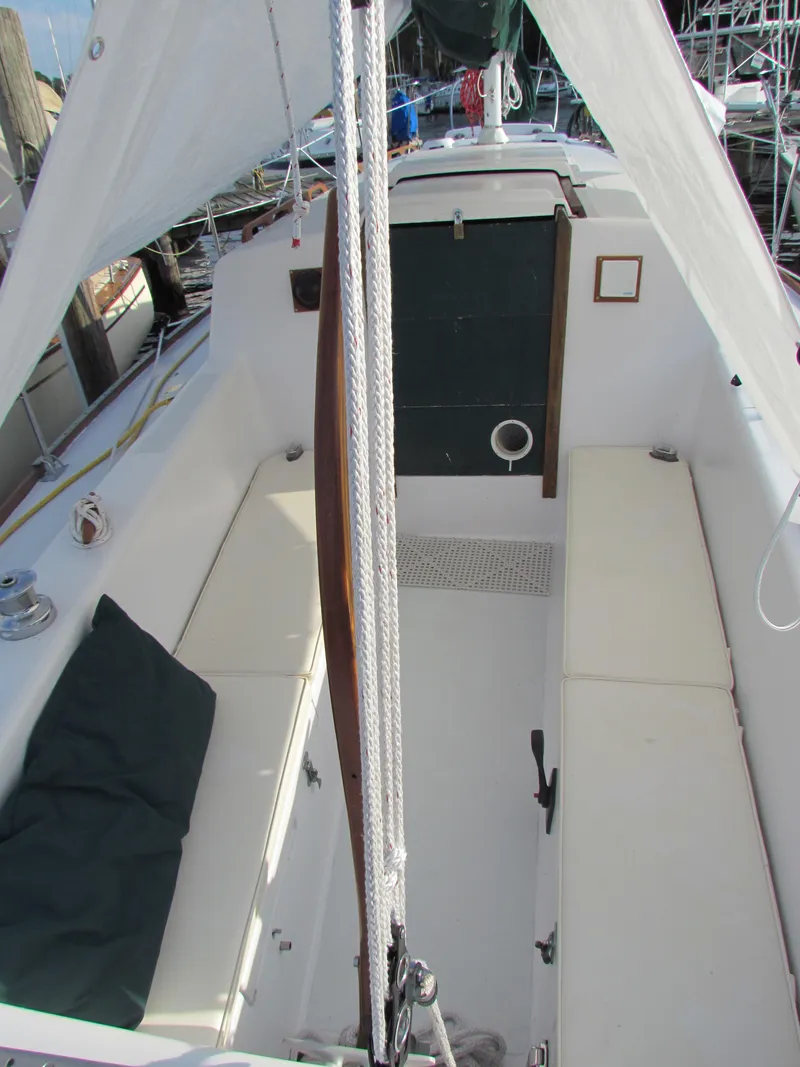 Slide: The Image of 1972 Morgan 35 sailboat named "Princess" docked at a marina. - 5