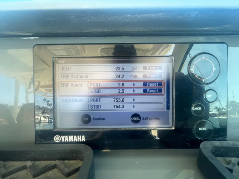 Slide: The Image of Yamaha display showing trip data on a 2011 Pursuit 315 Offshore boat. - 14