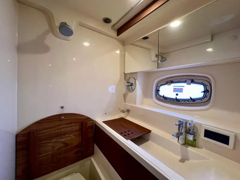 Slide: The Image of Luxurious bathroom interior of 2014 Sea Ray 410 Sundancer yacht with modern fixtures. - 45