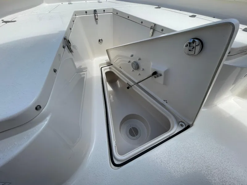 Slide: The Image of 2023 Sea Chaser 24 HFC boat storage compartment with open hatch. - 16