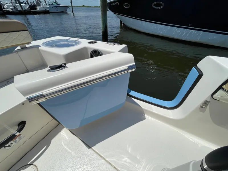 Slide: The Image of 2023 Sea Chaser 24 HFC boat interior with seating and water view. - 43