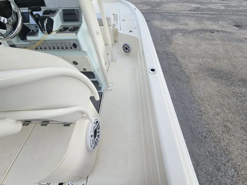 Slide: The Image of Interior view of 2024 ShearWater 25 LTZ boat deck. - 16