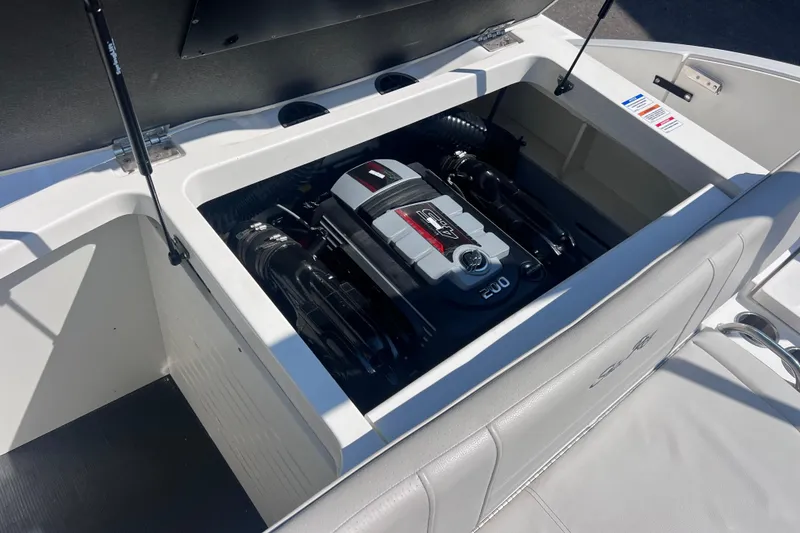 Slide: The Image of Engine compartment of a 2020 Sea Ray SPX 210 boat, showcasing the engine details. - 11