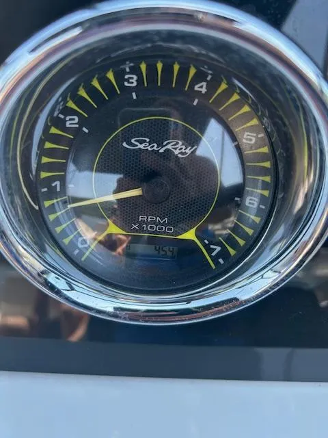 Slide: The Image of Tachometer of 2020 Sea Ray SPX 210 showing RPM reading. - 4