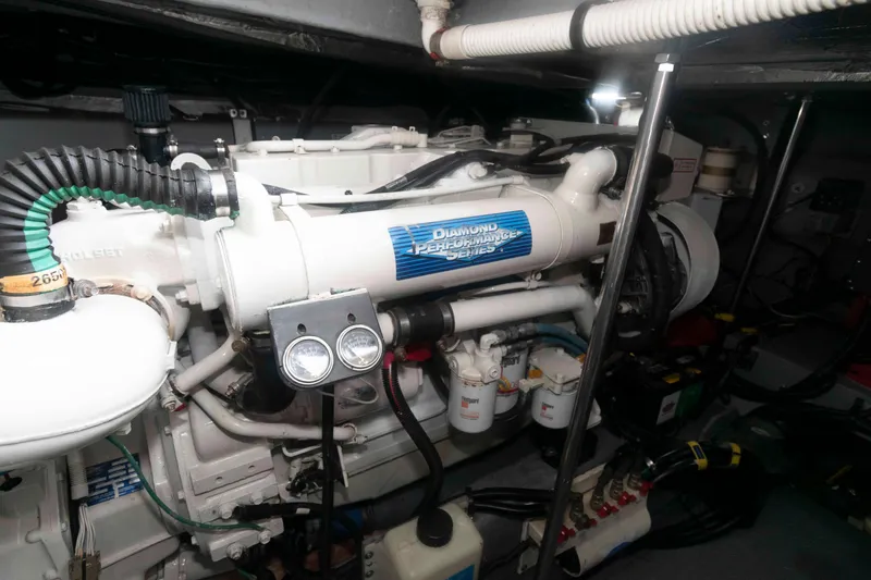 Slide: The Image of Engine room of 2001 Sea Ray 460 Sundancer with Diamond Performance Series engine. - 19